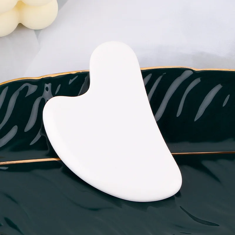 outil de soin en jade blanc